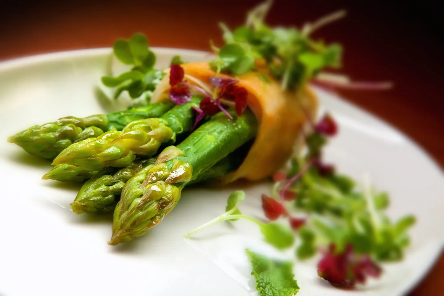 Crispy green asparagus with Parma Ham, Gruyere cheese andmint yoghurt dressing