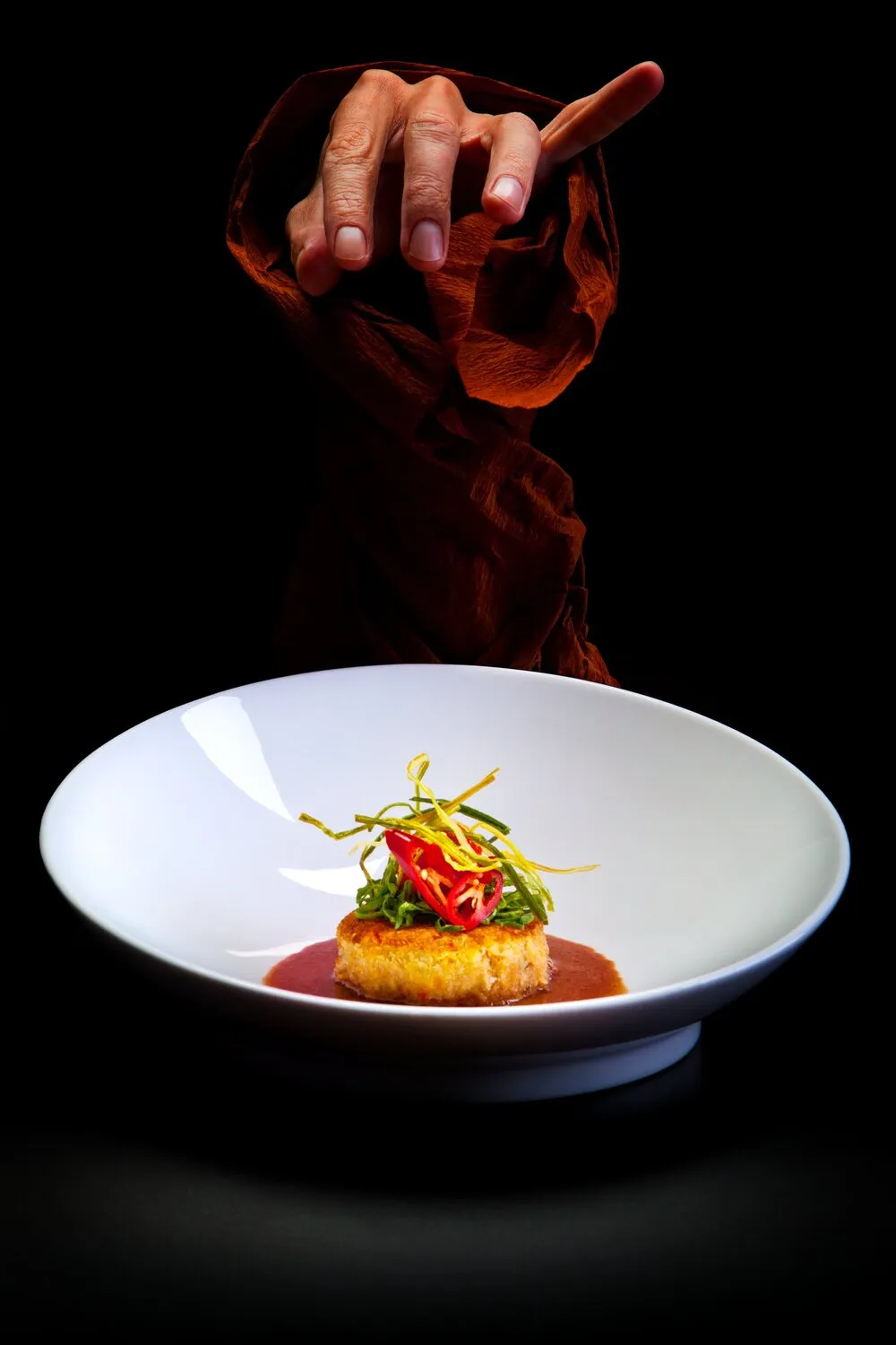 Crispy Kamchatka crab cake with sweet soy dressing andsprouts salad