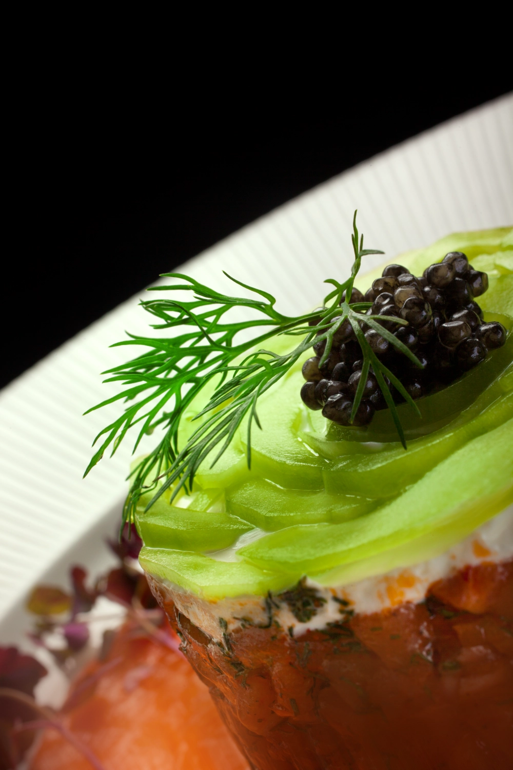 Smoked salmon and salmon tartar with lemon sour cream and beluga caviar by Sandy Bohm