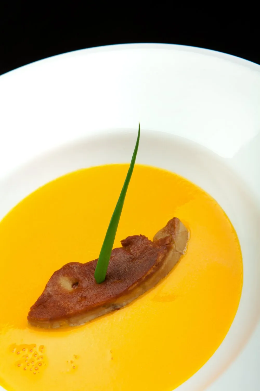 Pumpkin ginger soup with foie gras